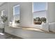 Bright living area featuring a window seat with a scenic city view and hardwood floors at 2501 15Th St # 3F, Denver, CO 80211