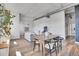 Open-concept living space with hardwood floors, modern furnishings, and a seamless flow for everyday living at 2501 15Th St # 3F, Denver, CO 80211