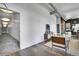Open-concept living space featuring modern decor, hardwood floors, and access to the kitchen at 2501 15Th St # 3F, Denver, CO 80211
