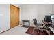 Office bedroom space that offers ample lighting and an ergonomic chair at 21961 E Crestline Pl, Aurora, CO 80015