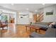 Spacious living room with hardwood floors, neutral walls, and open layout at 21961 E Crestline Pl, Aurora, CO 80015