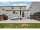 Outdoor patio with seating, grill, and sliding door to the home at 21961 E Crestline Pl, Aurora, CO 80015