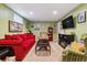 Basement featuring a large living space with updated carpets and soft textures at 3253 S Kalispell St, Aurora, CO 80013