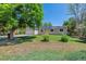 A lovely ranch-style home with brick and vinyl siding, solar panels, attached garage, and a well-kept lawn at 3253 S Kalispell St, Aurora, CO 80013