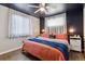 The main bedroom features modern paint, updated floors and bright natural light at 3253 S Kalispell St, Aurora, CO 80013