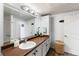 Clean bathroom with updated vanity, mirror and walk-in shower at 7240 W Custer Ave # 205, Lakewood, CO 80226