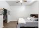 Spacious bedroom with a queen bed and built-in shelving at 7240 W Custer Ave # 205, Lakewood, CO 80226