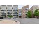 The Lofts building exterior, featuring modern architecture and landscaping at 7240 W Custer Ave # 205, Lakewood, CO 80226