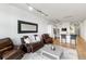 Open concept living and kitchen area with modern finishes at 7240 W Custer Ave # 205, Lakewood, CO 80226