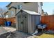 Backyard shed great for extra storage, gardening, and tool storage space at 10041 Dillon Cir, Commerce City, CO 80022