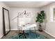 Comfortable office features a modern desk, carpet, and plenty of light at 1011 Yeager Dr, Longmont, CO 80501