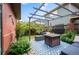 Cozy outdoor patio with firepit, comfortable seating, and lush landscaping at 8728 E 25Th Dr, Denver, CO 80238