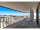 Spacious covered balcony offering panoramic city views, metal railings, and plenty of natural light at 1551 Larimer St # 2704, Denver, CO 80202