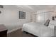 Cozy bedroom featuring a plush bed, neutral decor, and ample closet space at 1551 Larimer St # 2704, Denver, CO 80202