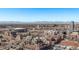 Spectacular city view featuring downtown buildings, sports venues, and distant mountain range at 1551 Larimer St # 2704, Denver, CO 80202