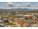 Scenic city view featuring a stadium, roller coaster and arena with snow-capped mountains in the background at 1551 Larimer St # 2704, Denver, CO 80202