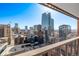 Balcony view showcasing the city skyline with a view of multiple skyscrapers on a sunny day at 1551 Larimer St # 2704, Denver, CO 80202