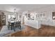 Dining area featuring modern lighting, an open floor plan, and view into the kitchen at 1551 Larimer St # 2704, Denver, CO 80202