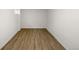 Finished basement room with hardwood floors at 4689 S Lowell Blvd, Denver, CO 80236