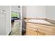 Mud room featuring sink and cabinets as well as entry to the living room at 22227 E Hinsdale Ave, Aurora, CO 80016