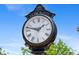 Close up of the historic clock tower in Olde Town Arvada at 7828 W 54Th Ave, Arvada, CO 80002