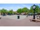 Town Square with brick pavers, benches, trees, and the historic Arvada clock tower at 7828 W 54Th Ave, Arvada, CO 80002
