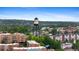 A captivating view of the city featuring the iconic water tower, complemented by lush greenery and charming buildings at 7828 W 54Th Ave, Arvada, CO 80002