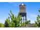 The Arvada water tower is a familiar local landmark set against a clear, blue sky at 7828 W 54Th Ave, Arvada, CO 80002