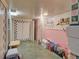 Unfinished basement space featuring pantry and storage at 8300 W 67Th Ave, Arvada, CO 80004