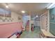 Unfinished basement area with stairs and utility access at 8300 W 67Th Ave, Arvada, CO 80004
