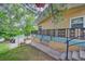 Exterior view of property, including stairway access to the front porch at 8300 W 67Th Ave, Arvada, CO 80004