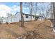 Backyard view of home with shed and trees at 4198 E 117Th Ave, Thornton, CO 80233