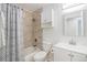 Clean bathroom with a shower/tub combo and updated vanity at 4198 E 117Th Ave, Thornton, CO 80233