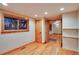 Bedroom with hardwood floors, wood trim windows, and wood doors at 3428 W County Road 4, Berthoud, CO 80513