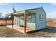 Exterior of an outbuilding with a porch at 3428 W County Road 4, Berthoud, CO 80513