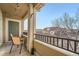 Relaxing balcony features seating, string lights, and scenic neighborhood views at 431 Black Feather Loop # 817, Castle Rock, CO 80104