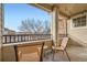 Inviting balcony space featuring seating, string lights, and neighborhood views at 431 Black Feather Loop # 817, Castle Rock, CO 80104