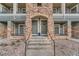 Charming entrance showcasing paired entrances and stone accents for an inviting appeal at 431 Black Feather Loop # 817, Castle Rock, CO 80104