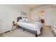 A serene main bedroom offering a peaceful retreat with soft lighting and a stylish headboard at 431 Black Feather Loop # 817, Castle Rock, CO 80104