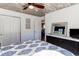 Well-lit bedroom with a dark dresser, closet, and ample natural light from the window at 11043 Valleybrook Cir, Highlands Ranch, CO 80130