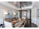 Traditional dining area enhanced with buffet, lighting, and decorative serving ware at 11043 Valleybrook Cir, Highlands Ranch, CO 80130