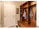 Mud room features an exterior door, coat hooks, and a wooden bench with drawers at 11043 Valleybrook Cir, Highlands Ranch, CO 80130