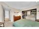 Well-organized bedroom boasts a spacious closet, and carpet flooring for added comfort at 1226 S Monaco Pkwy # 308, Denver, CO 80224