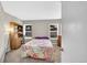 Cozy bedroom with a desk and ample natural light from two large windows at 1226 S Monaco Pkwy # 308, Denver, CO 80224