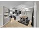 Charming dining area with a modern light fixture above a rustic table for two at 1226 S Monaco Pkwy # 308, Denver, CO 80224