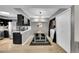 Open floor plan with a dining area adjacent to a kitchen and laundry room at 1226 S Monaco Pkwy # 308, Denver, CO 80224