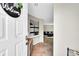 Welcoming entryway featuring tile flooring and views of the living room in this charming home at 1226 S Monaco Pkwy # 308, Denver, CO 80224