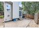 Back patio with brick pavers, providing an inviting outdoor living area with fence at 2238 S Nile Ct, Aurora, CO 80014