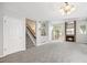 Bright living room with a cozy fireplace and soaring ceilings at 2238 S Nile Ct, Aurora, CO 80014