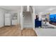 Spacious basement with laminate flooring, staircase, and leads to another room at 2295 Sandhurst Dr, Castle Rock, CO 80104